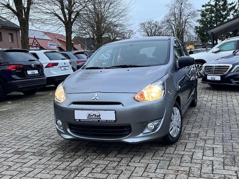 Grau Gebraucht 2015 Mitsubishi Space Star Basis Kleinwagen | 4.700 € (Fairer Preis) - Bild 1/4