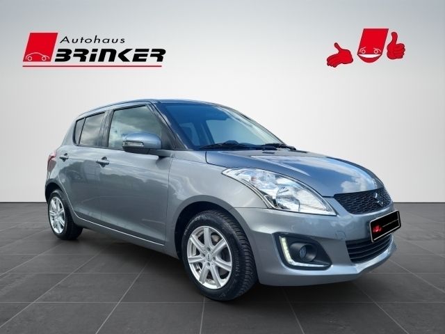 Grau Gebraucht 2013 Suzuki Swift Comfort Limousine | 7.430 € (Fairer Preis) - Bild 1/4