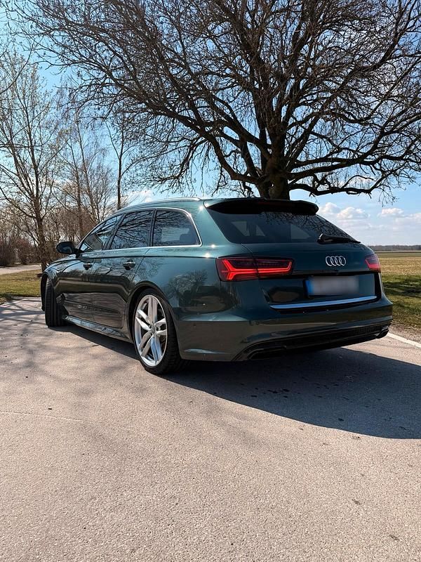 Second-hand Audi A6 Exclusive 320 CP (235 kW) 2018 Verde Break