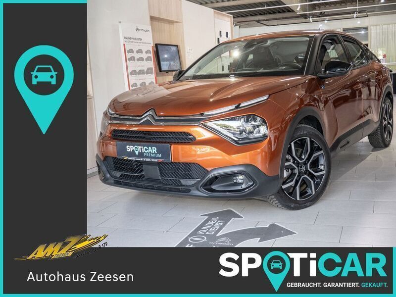 Karamellbraun (metallic) Gebraucht 2022 Citroën e-C4 Feel Limousine | 16.850 € (Guter Preis) - Bild 1/4