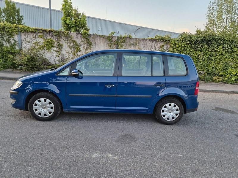 Blau Gebraucht 2009 VW Touran Conceptline Van / Kleinbus | 4.499 € (Fairer Preis) - Bild 1/4