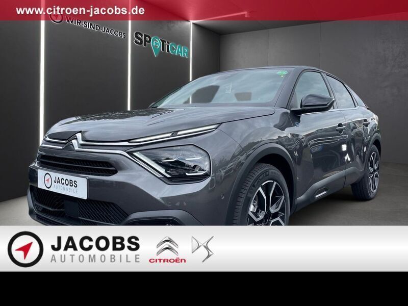 Grau Gebraucht 2023 Citroën e-C4 Shine Limousine | 22.470 € (Fairer Preis) - Bild 1/4