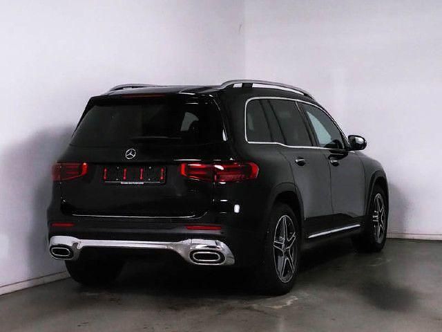 Kosmosschwarz metallic Gebraucht 2024 Mercedes GLB250 AMG SUV | 52.490 € (Teuer) - Bild 1/4