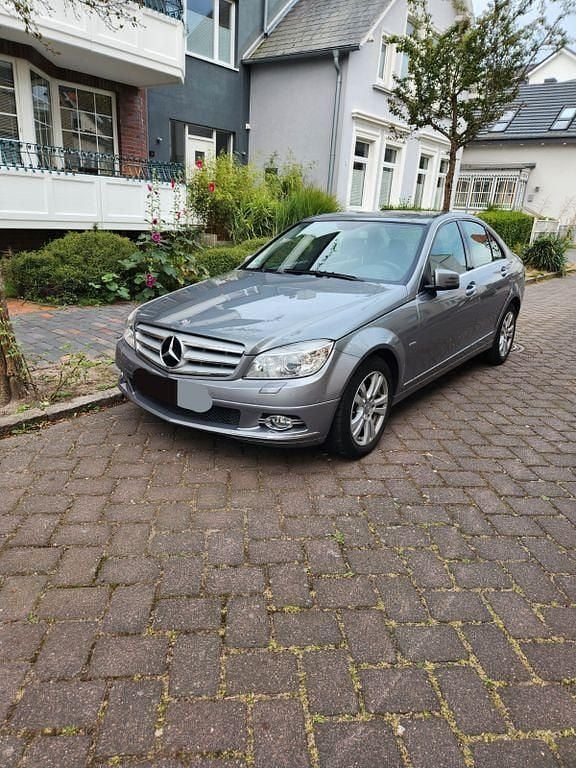 Grau Gebraucht 2009 Mercedes C230 Avantgarde Limousine | 7.990 € (Fairer Preis) - Bild 1/4