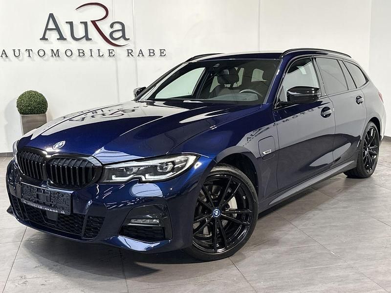 Tansanitblau ii Gebraucht 2022 BMW 330e M Sport Kombi | 32.449 € (Fairer Preis) - Bild 1/4