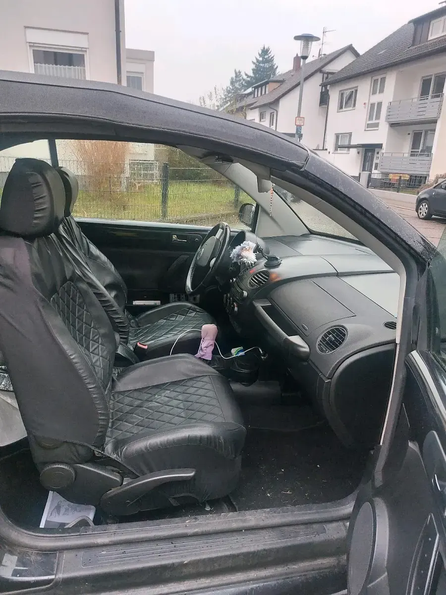 Gebraucht VW New Beetle 75 PS (55 kW) 2009 Schwarz Kleinwagen