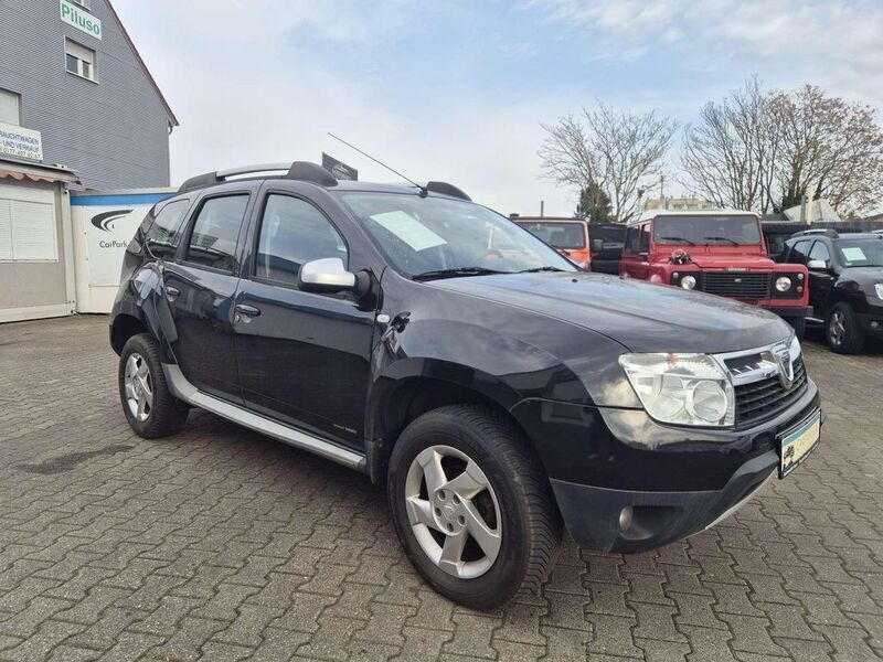 Perlmuttschwarz Gebraucht 2012 Dacia Duster Lauréate SUV | 5.900 € (Fairer Preis) - Bild 1/4