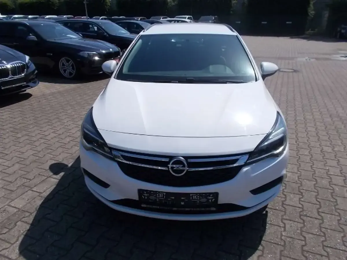Gebraucht Opel Astra Business 110 PS (80 kW) 2018 Schneeweiss/summitwhite/arctic Kombi