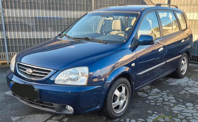 Blau Gebraucht 2006 Kia Carens Van / Kleinbus | 4.200 € (Teuer) - Bild 1/4