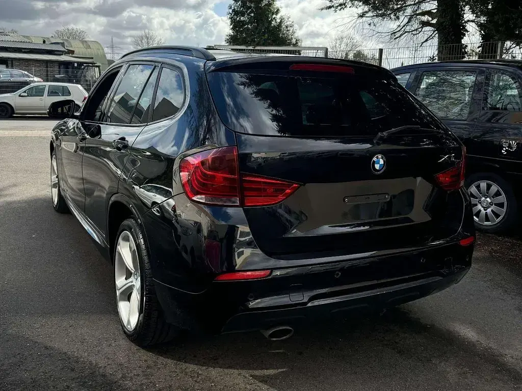 Gebraucht BMW X1 Performance 218 PS (160 kW) 2013 Black sapphire metallic SUV