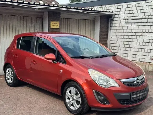 Gebraucht Opel Corsa Satellite 87 PS (63 kW) 2012 Orange Kleinwagen