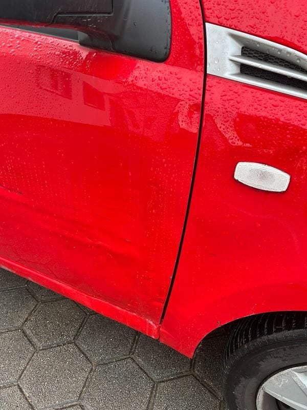 Gebraucht Chevrolet Aveo 84 PS (61 kW) 2009 Rot Kleinwagen