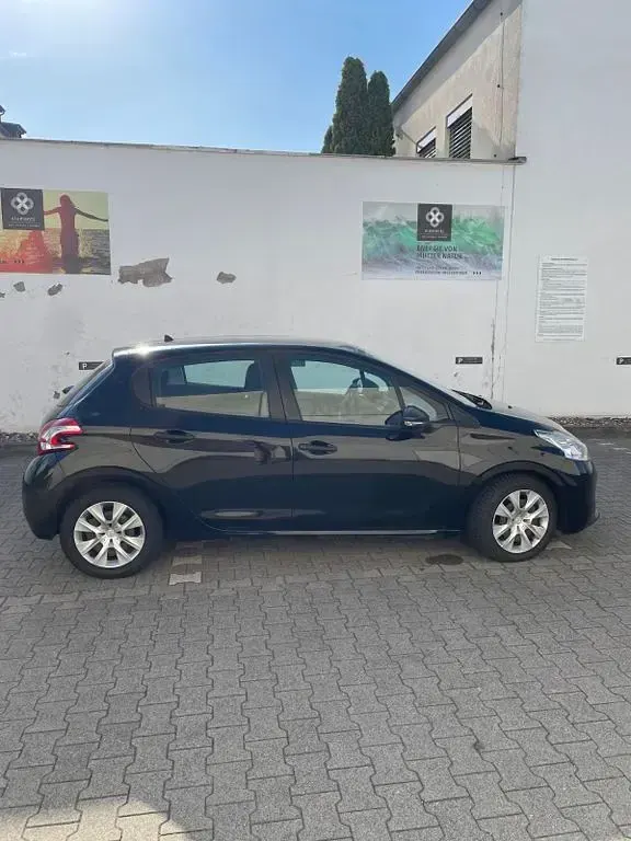 Gebraucht Peugeot 208 Access 68 PS (50 kW) 2012 Schwarz Kleinwagen