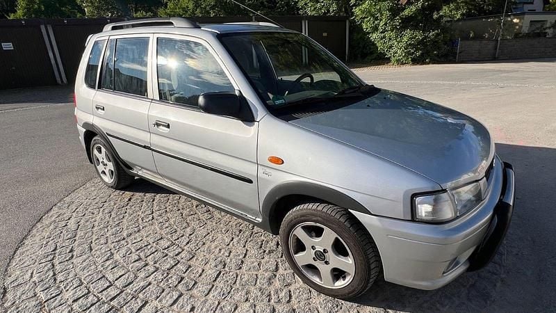 Grau Gebraucht 1999 Mazda Demio Exclusive Kleinwagen | 1.299 € (Fairer Preis) - Bild 1/4