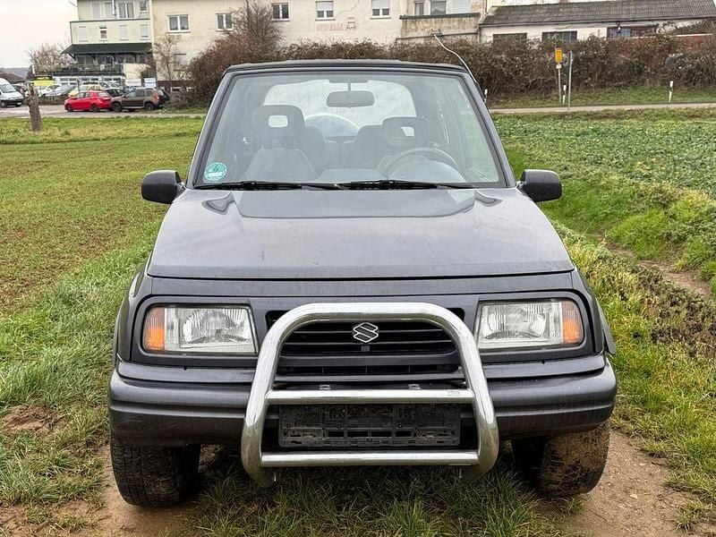 Grau Gebraucht 1997 Suzuki Vitara Cabrio | 2.499 € (Guter Preis) - Bild 1/4