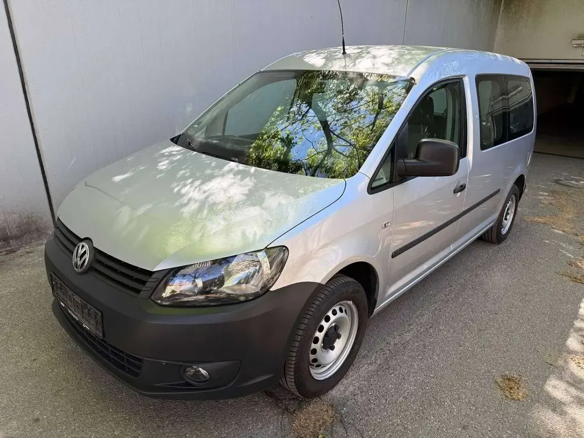 Second-hand VW Caddy Maxi 149 CP (109 kW) 2013 Argintiu Monovolum