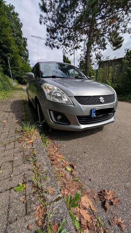 Gebraucht 2014 Suzuki Swift Comfort Limousine | 4.900 € (Superpreis) - Bild 1/3