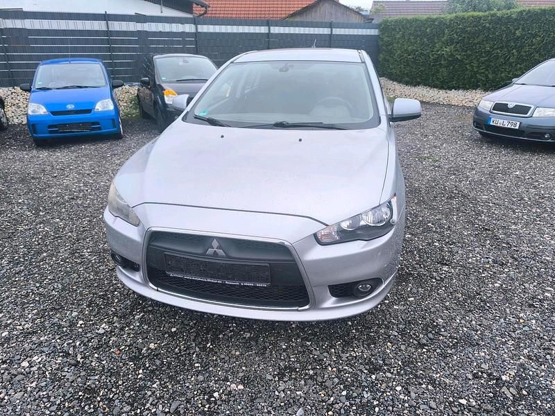 Silber Gebraucht 2010 Mitsubishi Lancer Limousine | 1.500 € - Bild 1/4