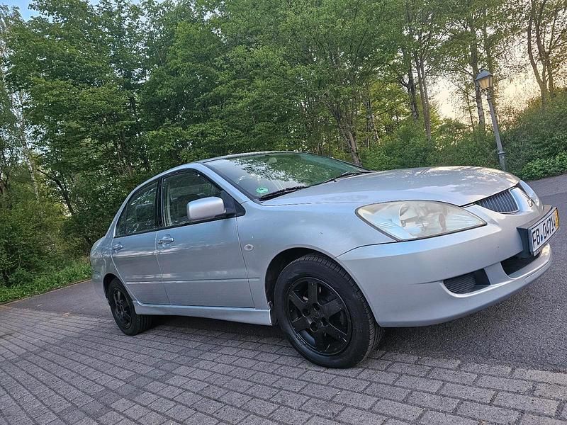 Grau Gebraucht 2003 Mitsubishi Lancer Limousine | 1.350 € - Bild 1/4