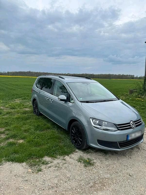 Second-hand VW Sharan 140 CP (102 kW) 2012 Albastru Monovolum