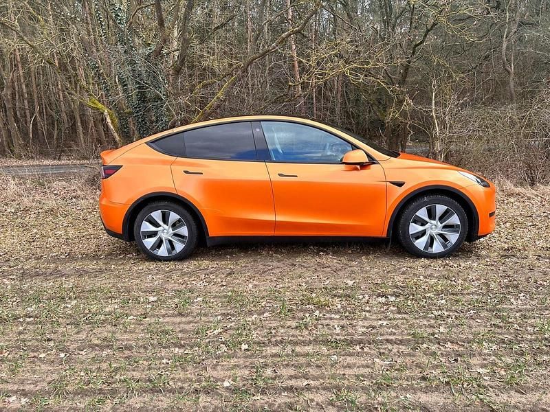 Gebraucht Tesla Model Y 255 kW (347 PS) 2023 Orange SUV
