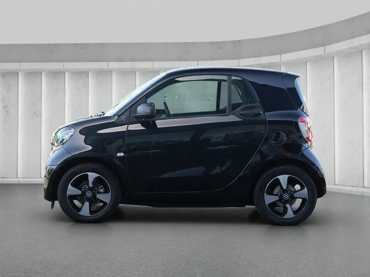 Gebraucht Smart ForTwo Coupé 60 kW (82 PS) 2024 Bodypanels in black Kleinwagen