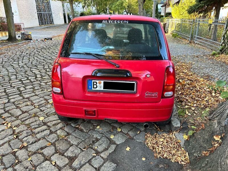Gebraucht Daihatsu Cuore 56 PS (41 kW) 1999 Rot Kleinwagen