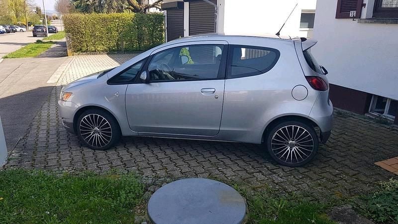 Gebraucht Mitsubishi Colt 95 PS (69 kW) 2012 Silber Kleinwagen