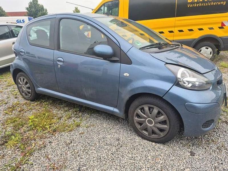 Greyish blue Gebraucht 2009 Toyota Aygo City Kleinwagen | 1.999 € (Guter Preis) - Bild 1/4