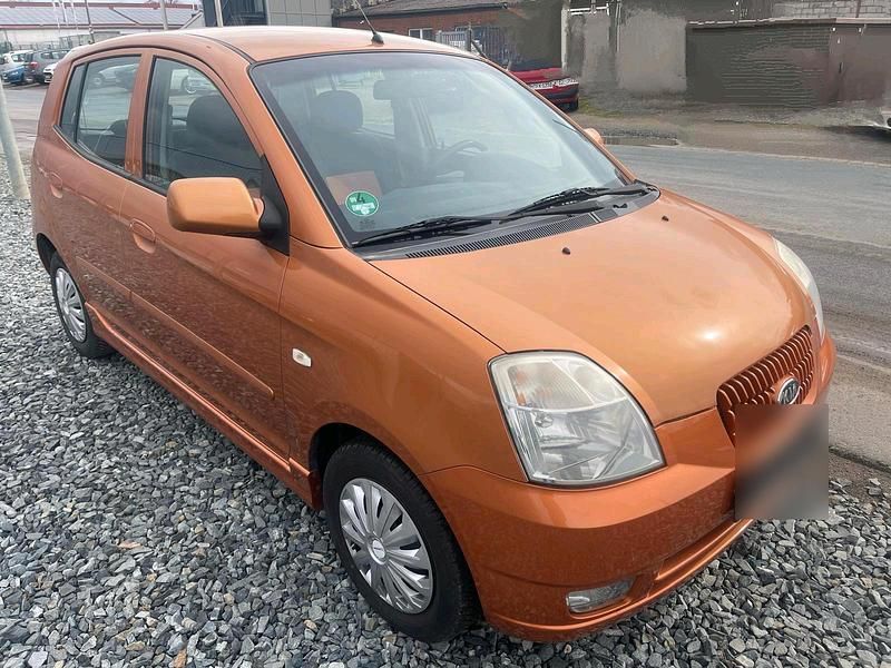 Second-hand Kia Picanto 55 CP (40 kW) 2006 Portocaliu Hatchback