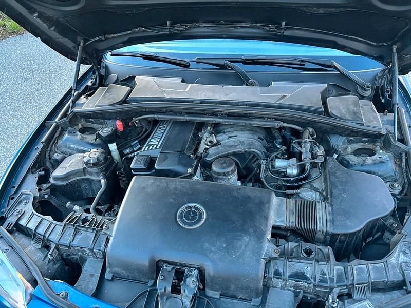 Second-hand BMW 116 115 CP (84 kW) 2005 Albastru Hatchback