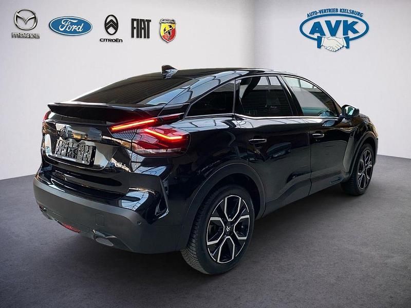 Gebraucht Citroën e-C4 Shine 100 kW (136 PS) 2024 Schwarz Limousine