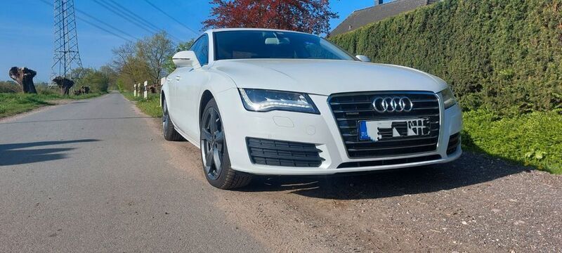 Weiß Gebraucht 2012 Audi A7 Sportback Ambiente Kleinwagen | 17.490 € (Guter Preis) - Bild 1/4