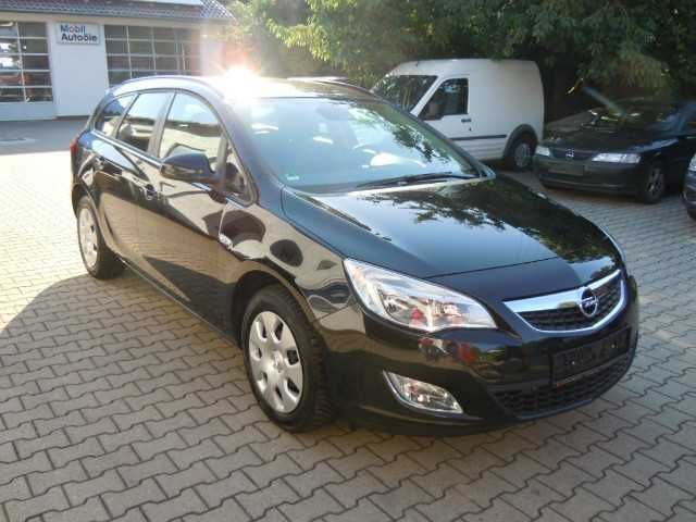 Schwarz metallic Gebraucht 2011 Opel Astra Design Edition Kombi | 14.900 € - Bild 1/4