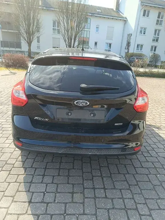Gebraucht Ford Focus Champions Edition 125 PS (91 kW) 2013 Schwarz Limousine