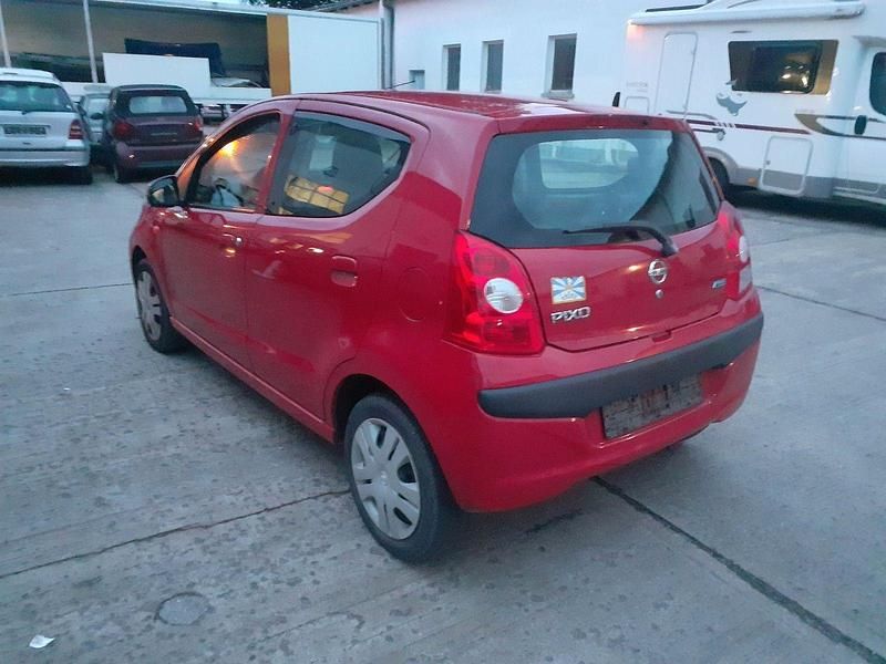 Gebraucht Nissan Pixo Acenta 68 PS (50 kW) 2011 Rot Kleinwagen