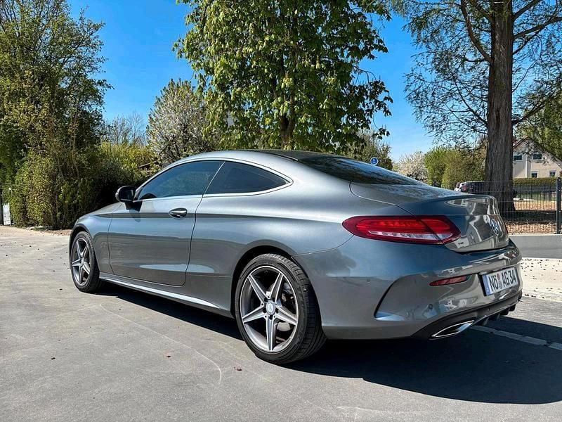 Grau Gebraucht 2016 Mercedes C180 AMG line Coupé | 15.990 € (Fairer Preis) - Bild 1/4