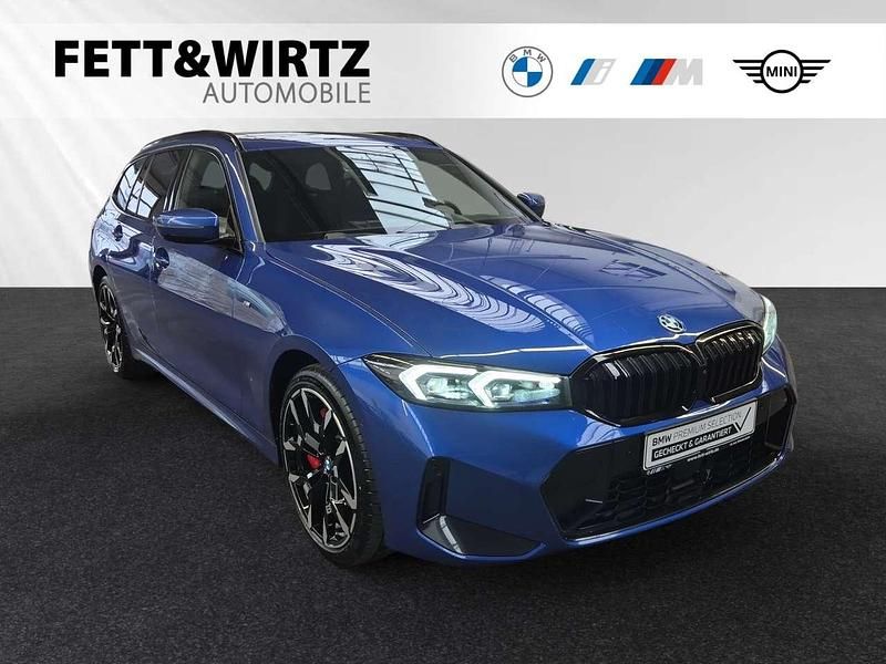 Portimao blau metallic Gebraucht 2024 BMW 330e M Sport Kombi | 48.800 € (Teuer) - Bild 1/2