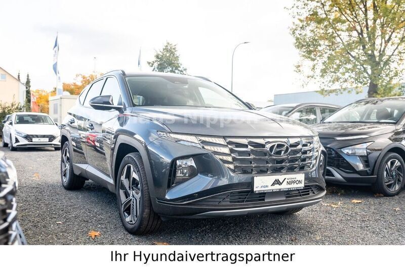 Grau Neu 2024 Hyundai Tucson Trend SUV | 41.985 € (Teuer) - Bild 1/4