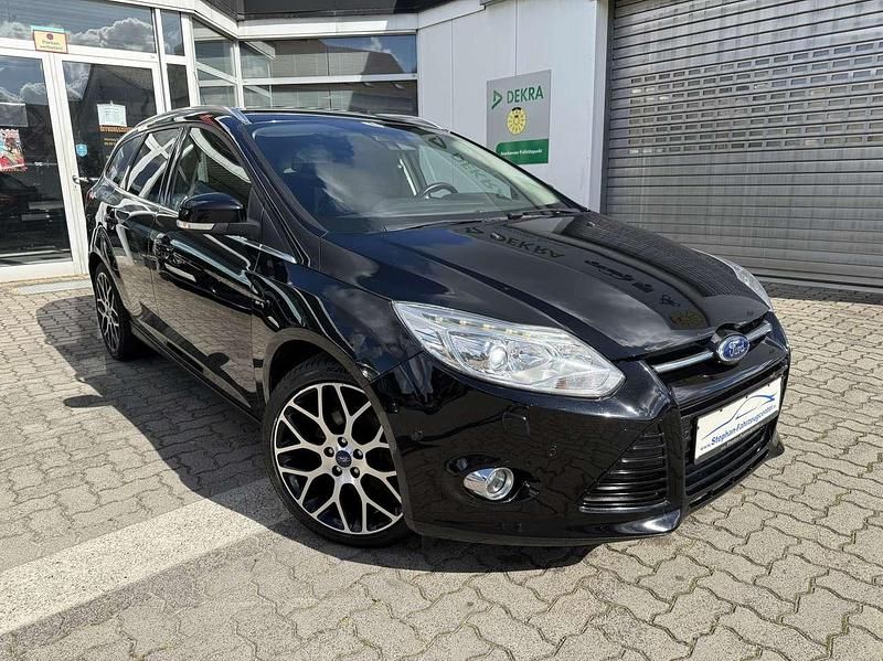 Pantherschwarz metallic Gebraucht 2014 Ford Focus Titanium Kombi | 7.490 € (Etwas zu teuer) - Bild 1/4