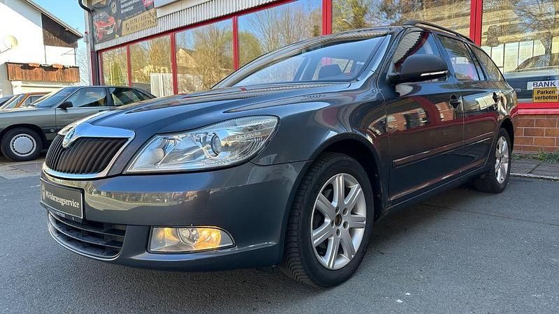 Używany Skoda Octavia 105 KM (77 kW) 2011 Szary Kombi