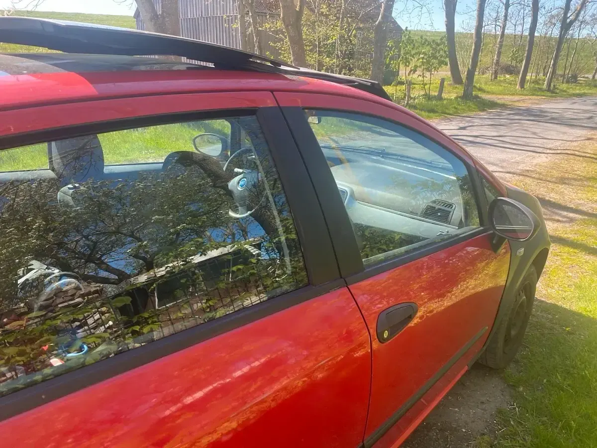 Brugt Fiat Punto 77 HK (56 kW) 2006 Rød Hatchback