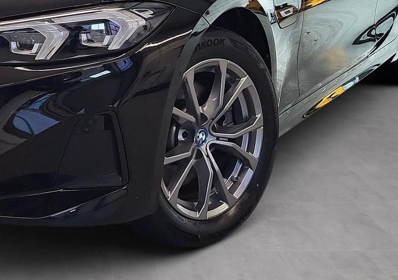 Second-hand BMW 320e 204 CP (150 kW) 2022 Negru Berlinǎ