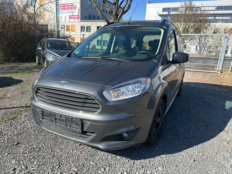 Grau Gebraucht 2015 Ford Tourneo Courier Titanium Van / Kleinbus | 7.999 € (Fairer Preis) - Bild 1/4