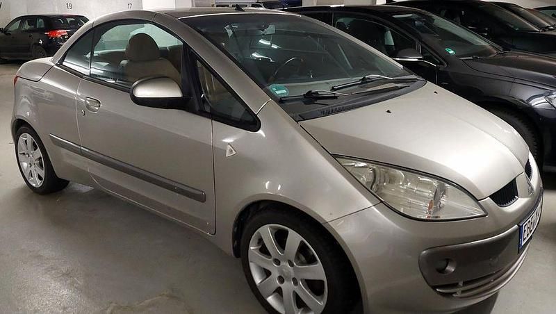 Second-hand Mitsubishi Colt Invite 109 CP (80 kW) 2008 Argintiu Cabrio