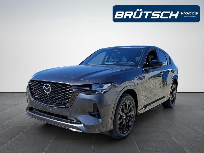 Machine gray metallic Neu 2025 Mazda CX-60 Homura-Line SUV | 60.590 € (Teuer) - Bild 1/4
