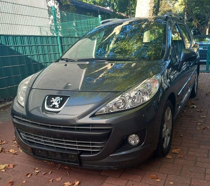 Gebraucht Peugeot 207 Premium 120 PS (88 kW) 2012 Grau Kombi