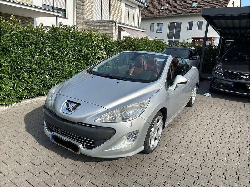 Silber Gebraucht 2009 Peugeot 308 CC Platinum Cabrio | 5.900 € (Fairer Preis) - Bild 1/4