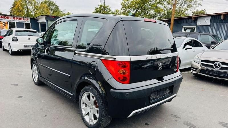 Gebraucht Peugeot 1007 Premium 73 PS (53 kW) 2008 Schwarz Van / Kleinbus