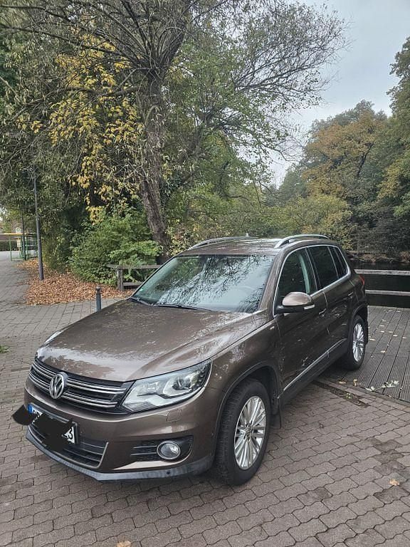 Braun Gebraucht 2014 VW Tiguan Cup SUV | 15.550 € (Guter Preis) - Bild 1/4